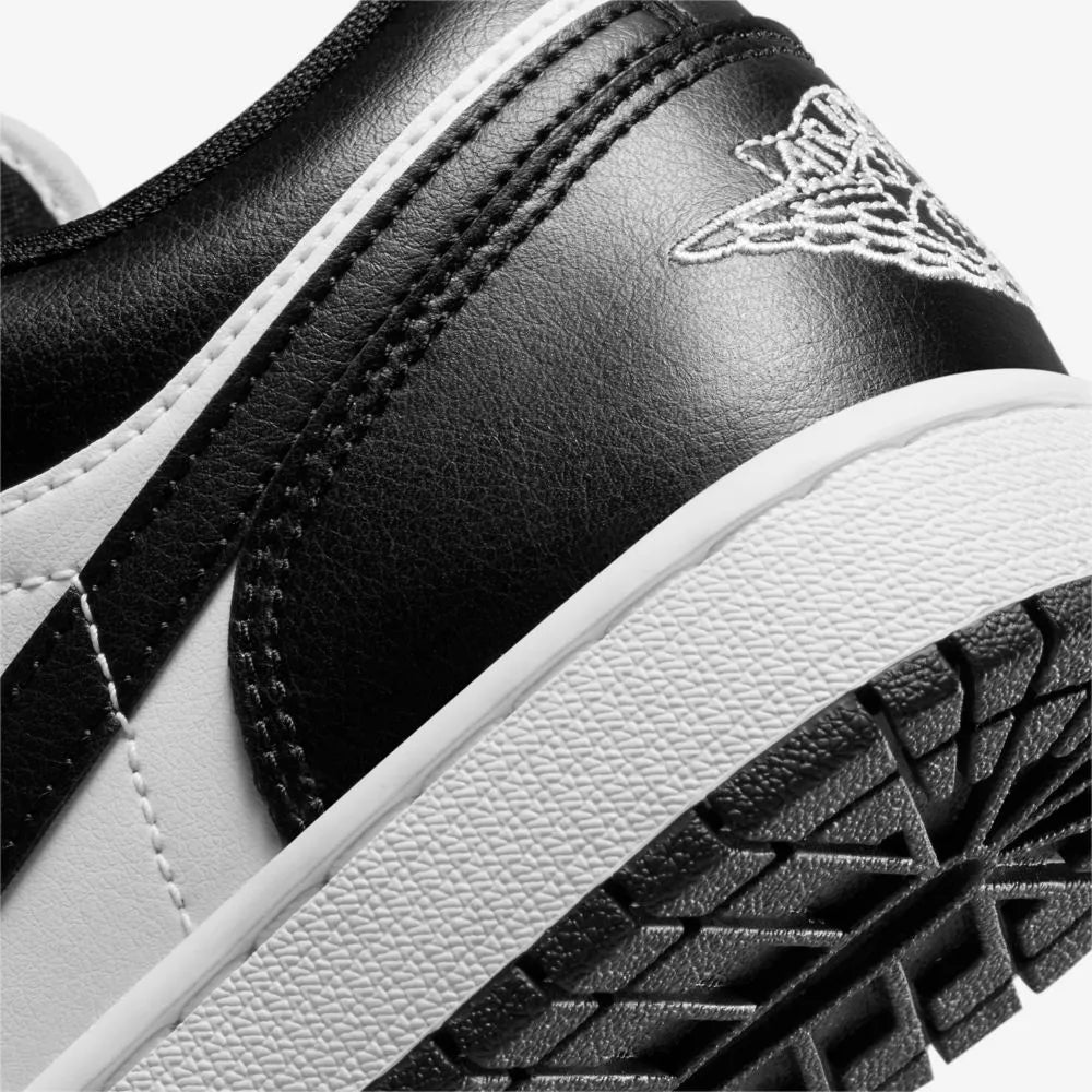 JORDAN RETRO 1 LOW BLANCO - NEGRO